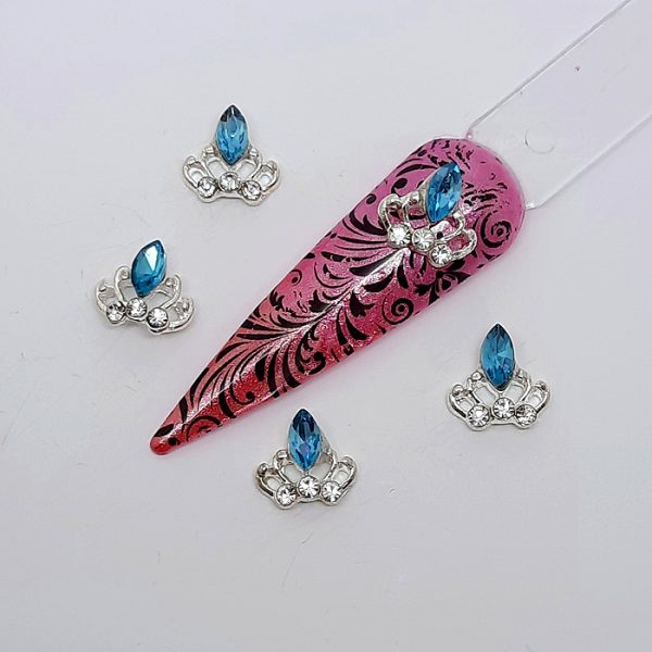 silver metal crown nail charms with clear and blue gems