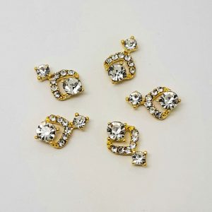 gold and clear crystal nail charms