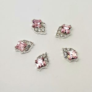 silver charms with pale pink and clear gems